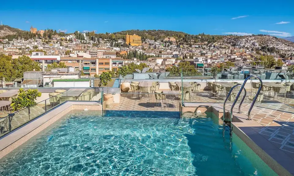 Barceló Carmen Granada rooftop pool with views of the Alhambra and Sierra Nevada