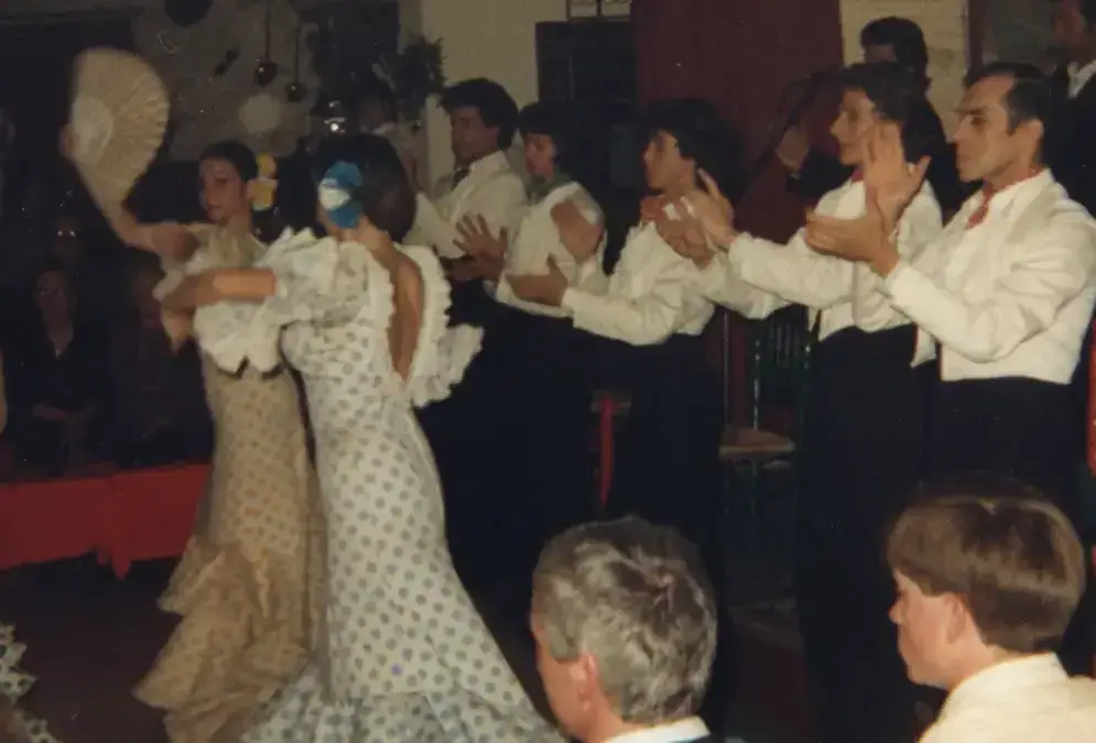 Flamenco dancer performing zambra in a whitewashed limestone cave in Sacromonte, Granada